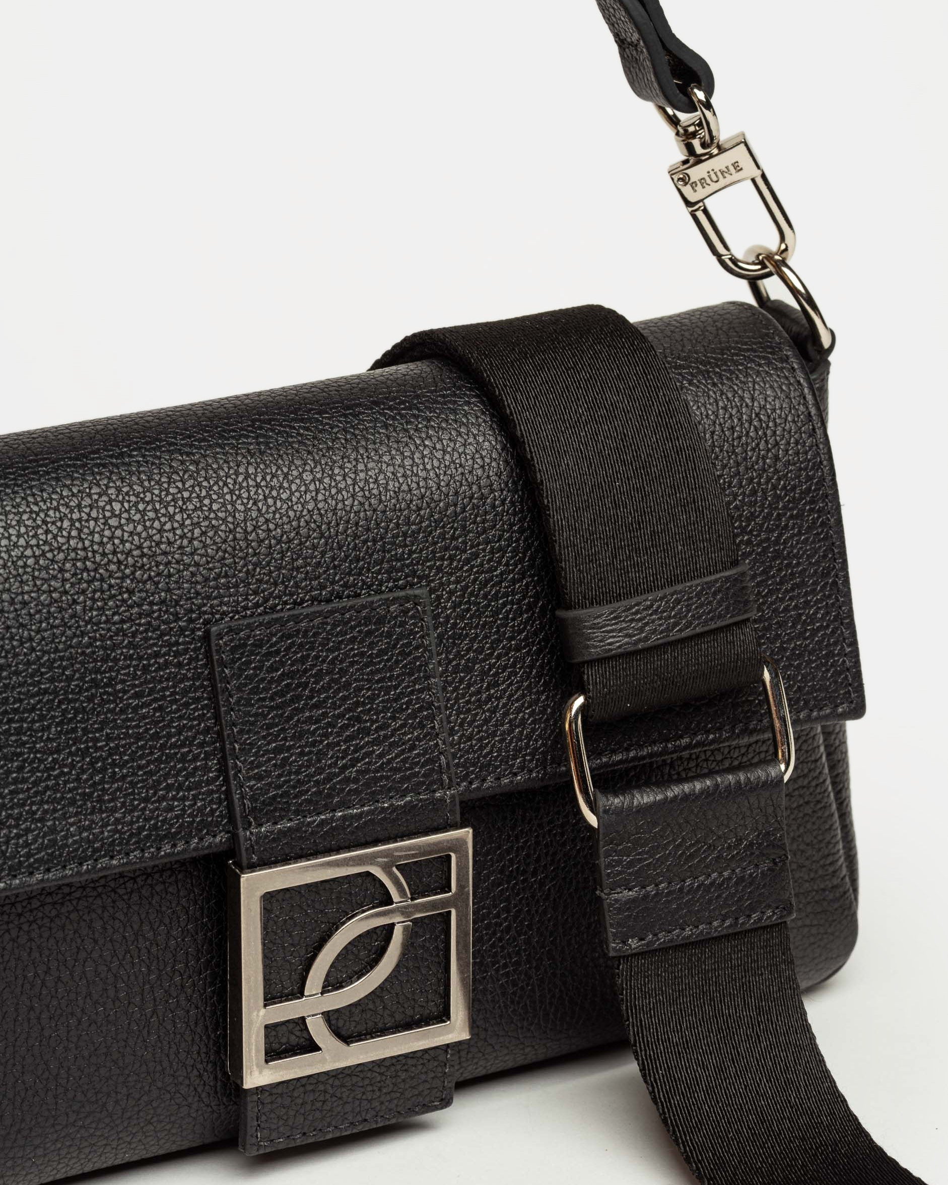 Cartera al hombro Signature en cuero graneado