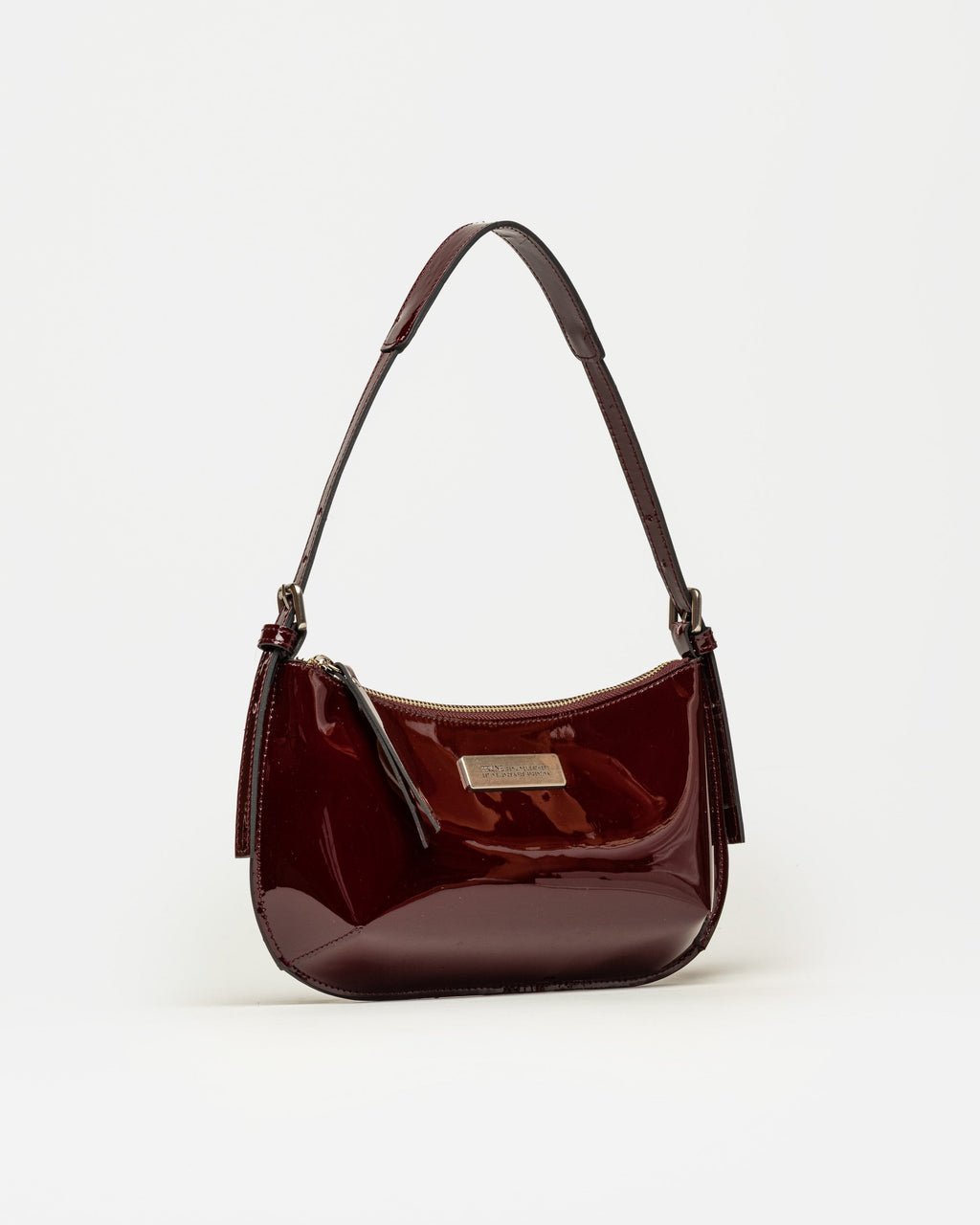 Cartera al hombro Mia en cuero charol